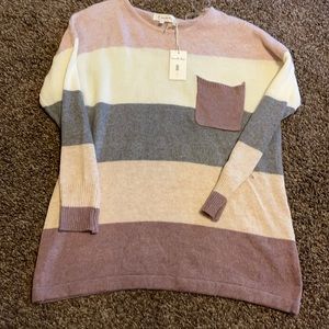 Multiple color stripe sweater with pocket
